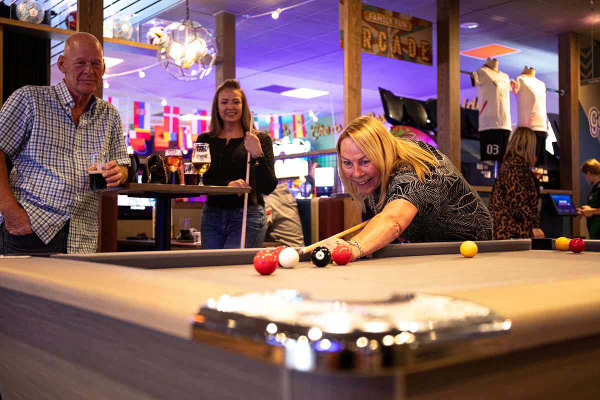 Guests playing pool at the Sports Café